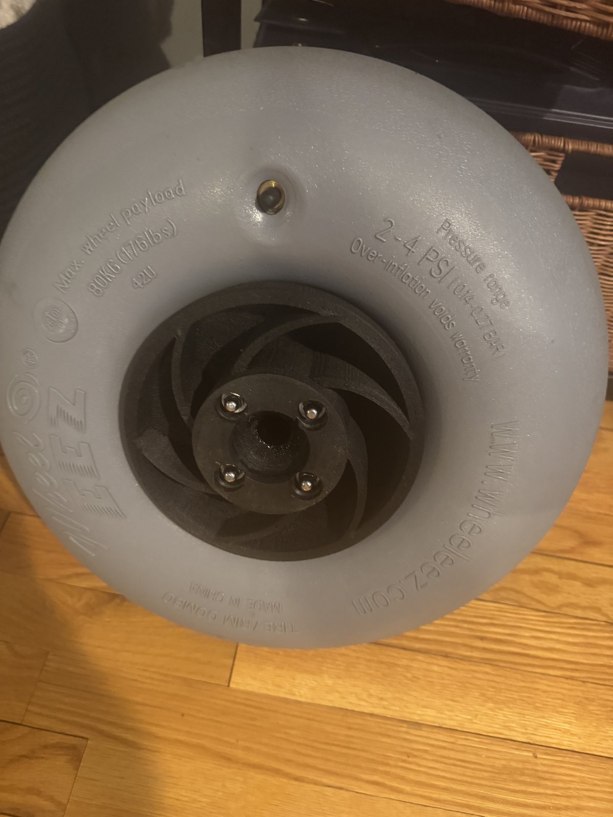 Finished wheel: carbon-fiber nylon hub bonded into the balloon tire